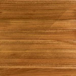 photo showing a swatch of spotted gum with and without a finish